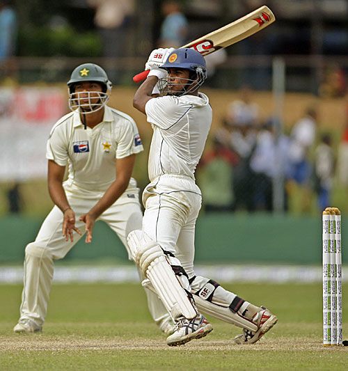 Malinda Warnapura cuts hard during his fifty