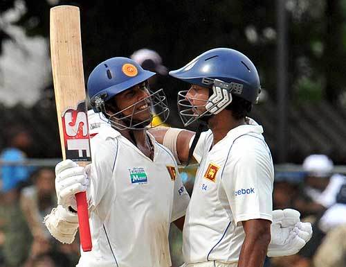 Malinda Warnapura gets a hug from his captain