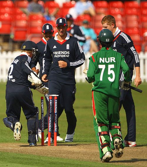 Adam Wheater whips off the bails to run out Noor Hossain