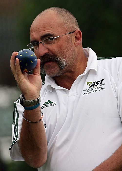 Eye of the tiger: Merv Hughes prepares to throw a shuttle during Australia's net session at Edgbaston