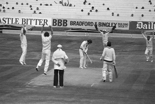 Chris Old bowls Allan Border