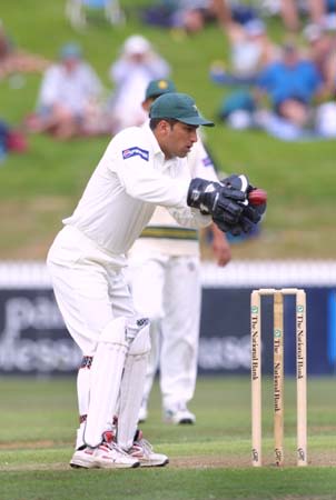 Humayun receives a return throw over the stumps