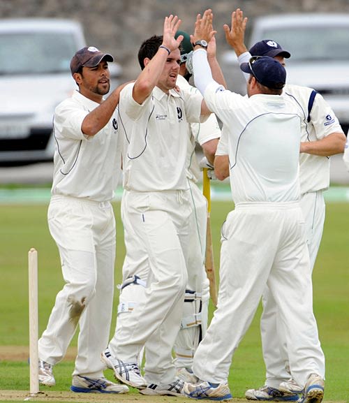 Gordon Goudie celebrates Jeremy Bray's wicket