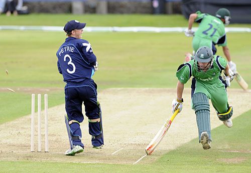 Wicketkeeper Marc Petrie celebrates William Porterfield's run-out
