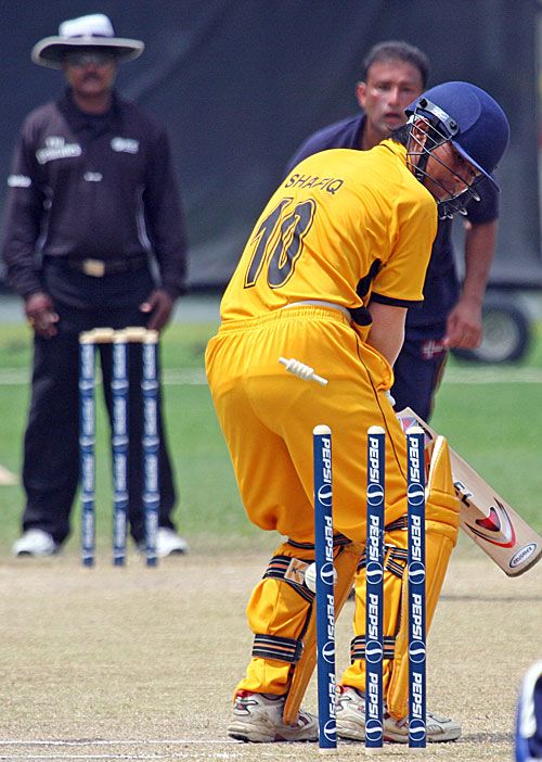 Shafiq Sharif is bowled by Aamer Waheed for 8