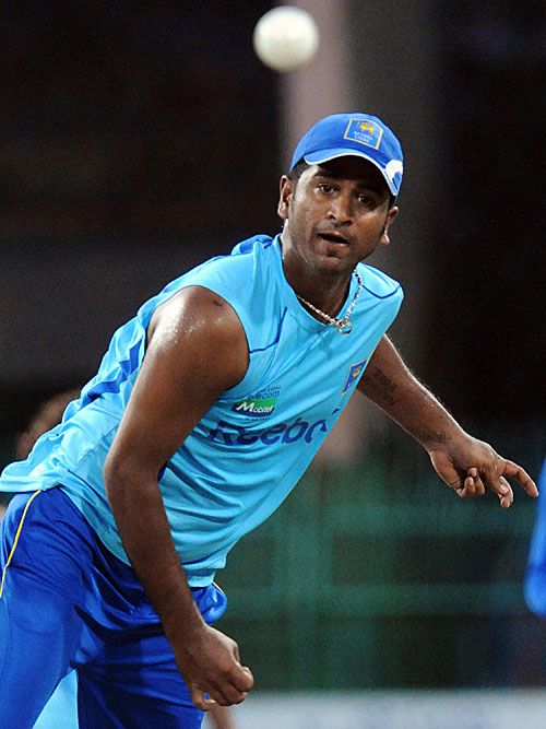 Kaushal Lokuarachchi bowls a delivery at the nets