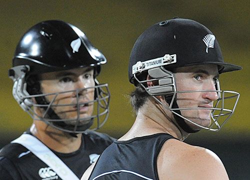 Peter McGlashan and Neil Broom await their turn at the nets