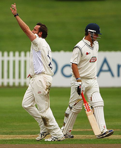 Steffan Jones celebrates the wicket of Rob Key