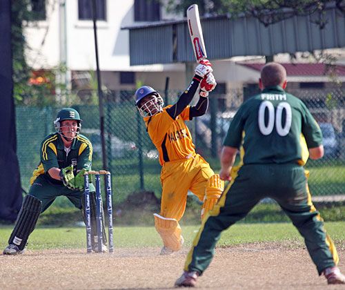 Suhan Alagaratnam hits a six on his way to an unbeaten 80