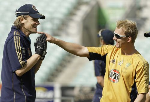 Nathan Bracken and Brett Lee share a lighter moment during a training session