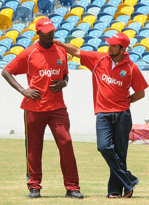 Vasbert Drakes and Ramnaresh Sarwan attend a Digicel Cricket Clinic
