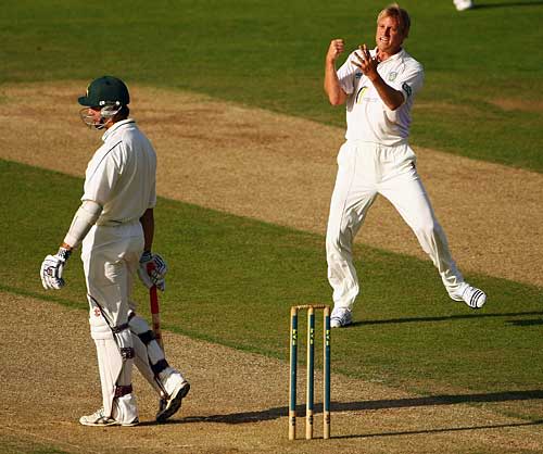 Mark Davies celebrates after removing Mark Wagh