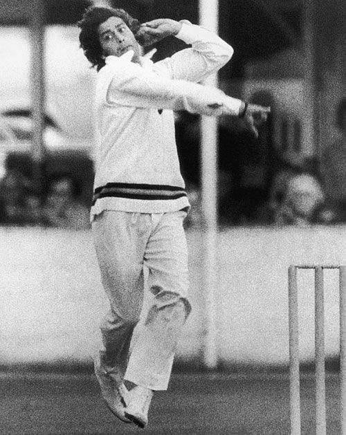 Eknath Solkar bowls against Somerset