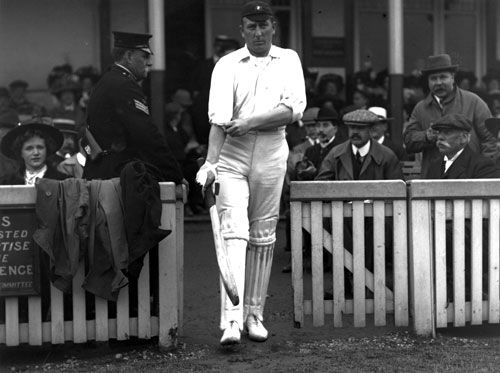 Warwick Armstrong walks out to bat