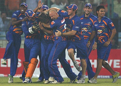Cornelius de Villiers is mobbed by his team-mates