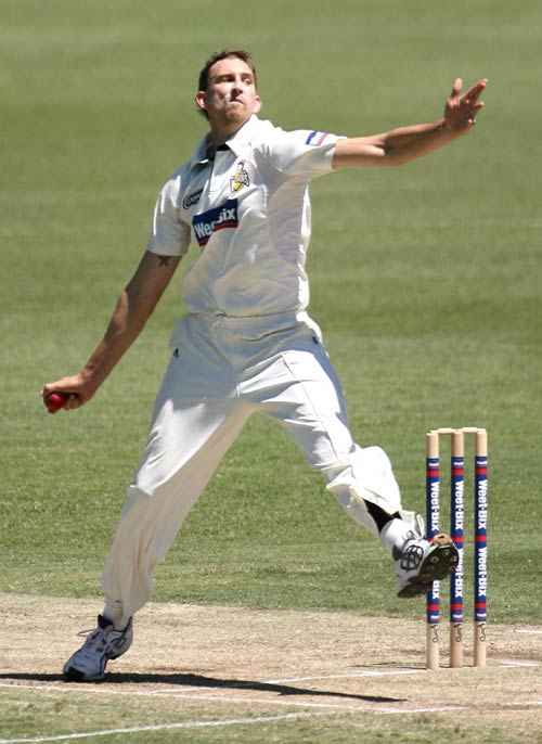 Brett Dorey sends down a delivery