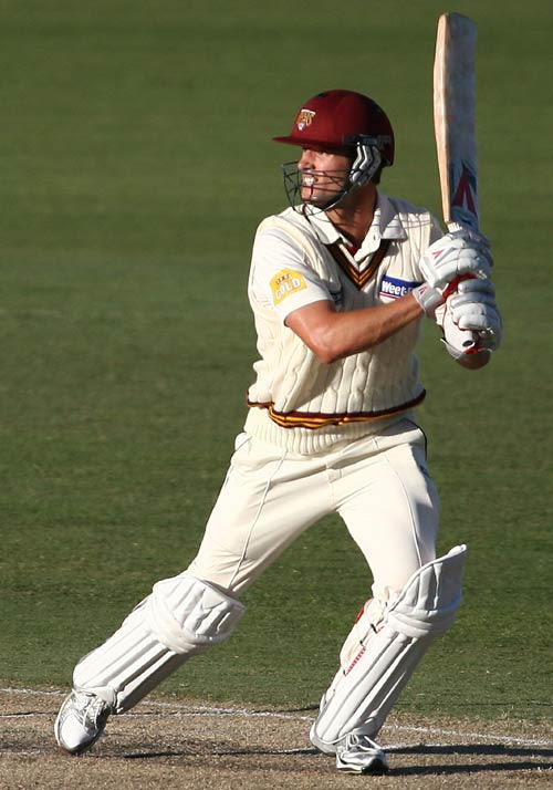 Chris Simpson cuts on his way to a half-century