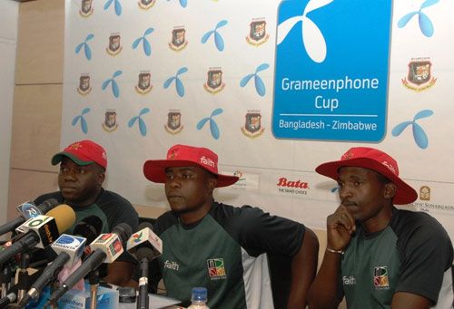 Zimbabwe team manager Walton Kafesu, captain Prosper Utseya and coach Walter Chawaguta at a media briefing