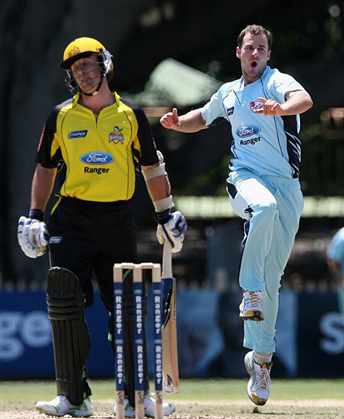 Burt Cockley celebrates after dismissing Luke Ronchi