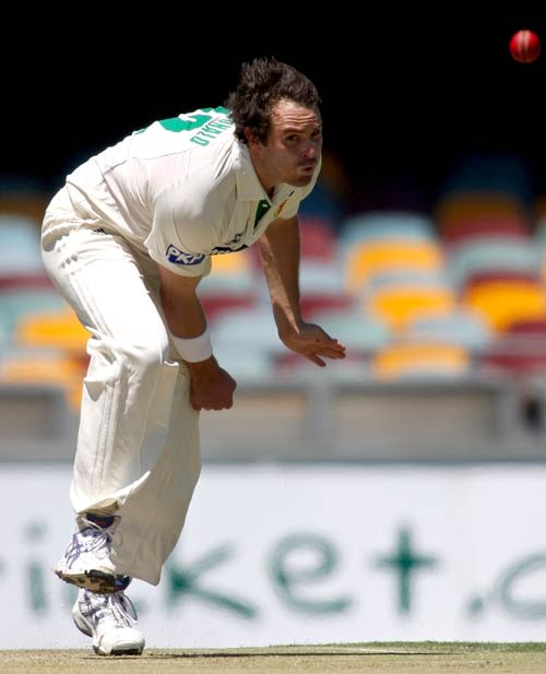 Tim Macdonald sends down a delivery