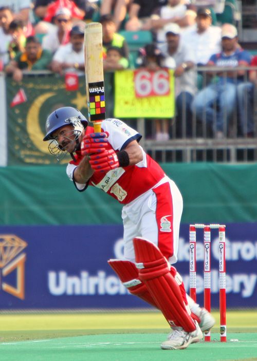 Munir Dar drives the ball down the ground during the 2009 Hong Kong Cricket Sixes