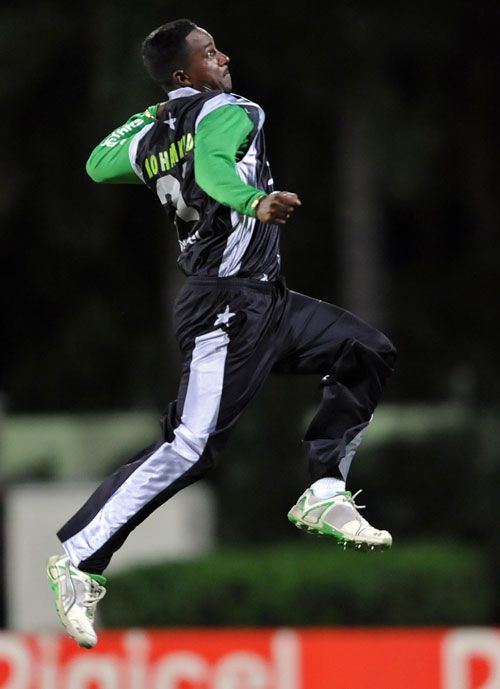 Dave Mohammed celebrates a wicket