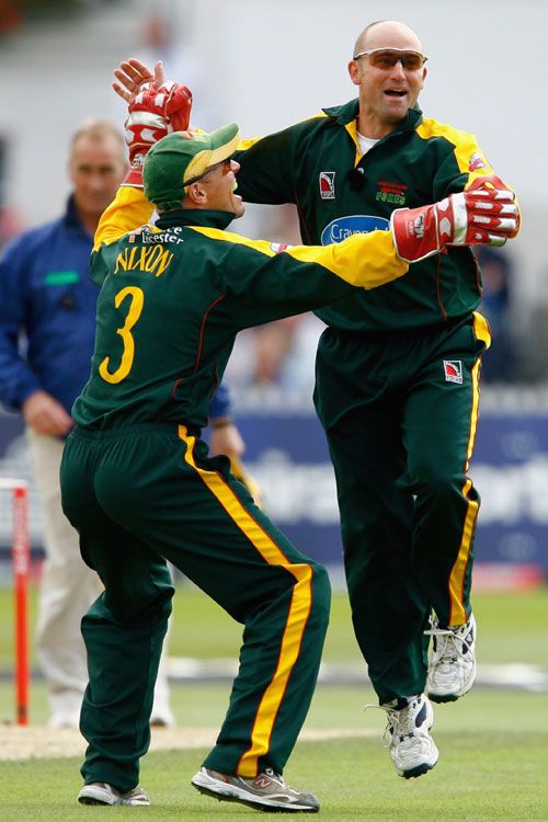 Paul Nixon and Jeremy Snape celebrate a wicket