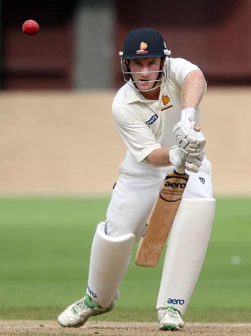 Chris Nevin watchfully defends