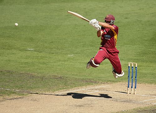 Lee Carseldine gets airborne to play the ball