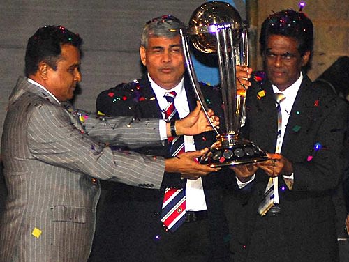 The chiefs of the Bangladesh, Indian and Sri Lankan cricket boards hold aloft the 2011 World Cup trophy