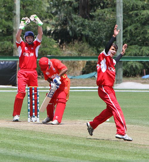 Asif Khan and James Atkinson appeal for LBW against Canada U19