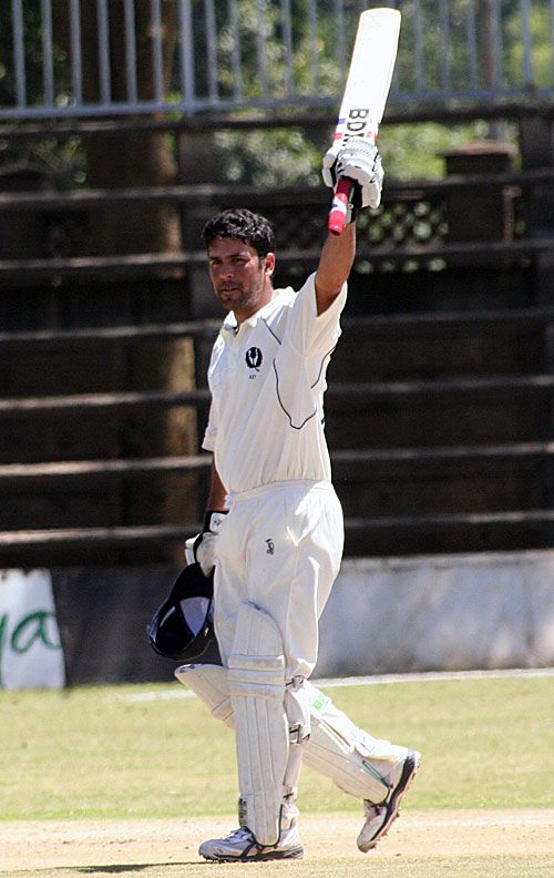 Qasim Sheikh celebrates his century