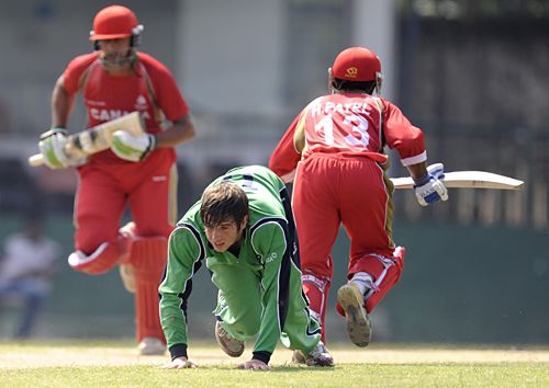 Gary Kidd is reduced to his knees by the Canada batsmen