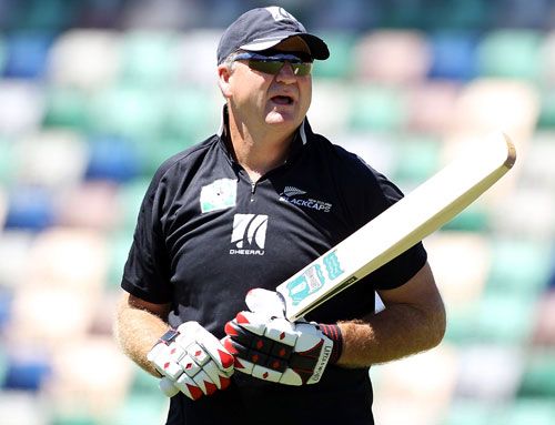 Mark Greatbatch helps with the New Zealand team's warm-up