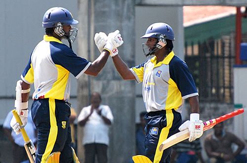 Chinthaka Jayasinghe and Jeewan Mendis celebrate adding 150