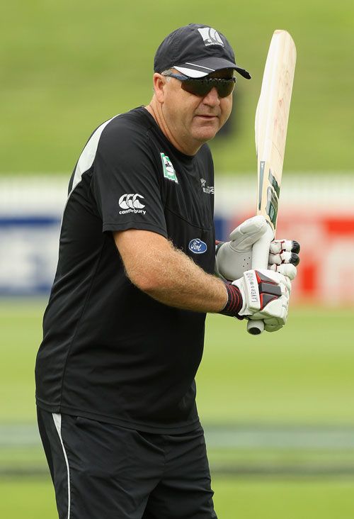 Mark Greatbatch, the New Zealand coach, wields a bat at the nets