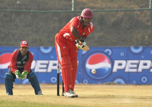 Singapore opener Buddika Mendis waits for the ball