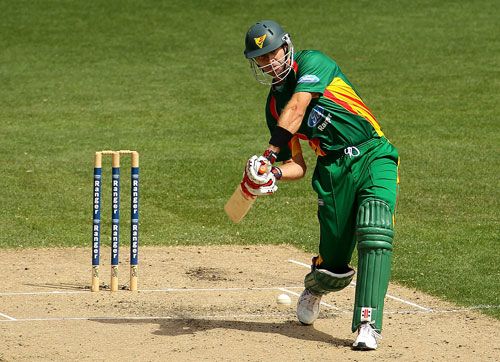 Michael Dighton attacks during his 80