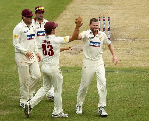 Chris Swan celebrates a wicket