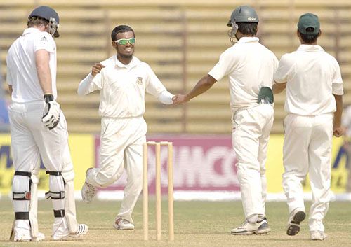 Mehrab Hossain Jr. celebrates the wicket of Ian Bell