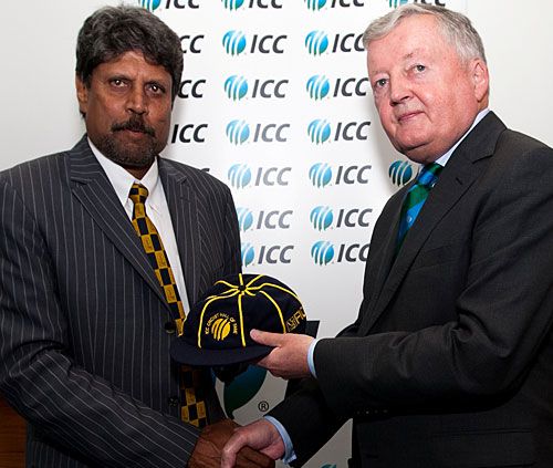 Kapil Dev gets a commemorative cap from David Morgan after being inducted into the ICC Hall of Fame