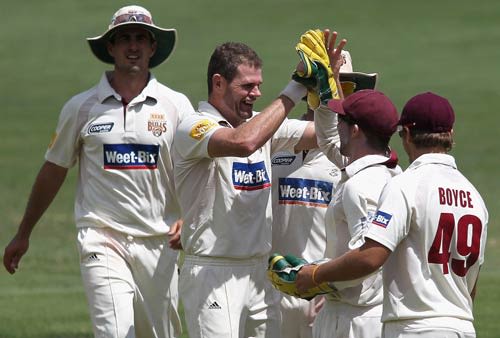 Chris Swan celebrates a wicket