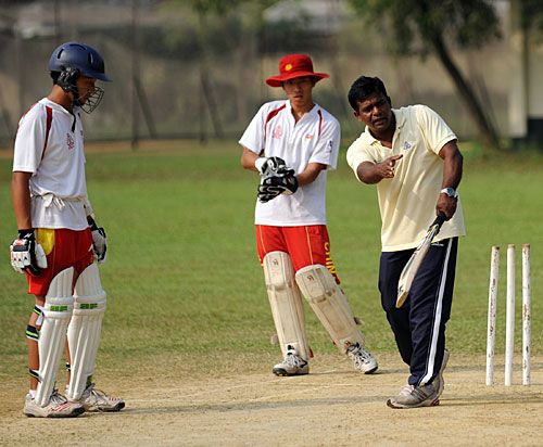 Aminul Islam teaches China's Under-19 cricket squad at Bangladesh's academy