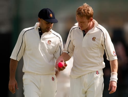 Scott Newman and Steve Kirby inspect the ball