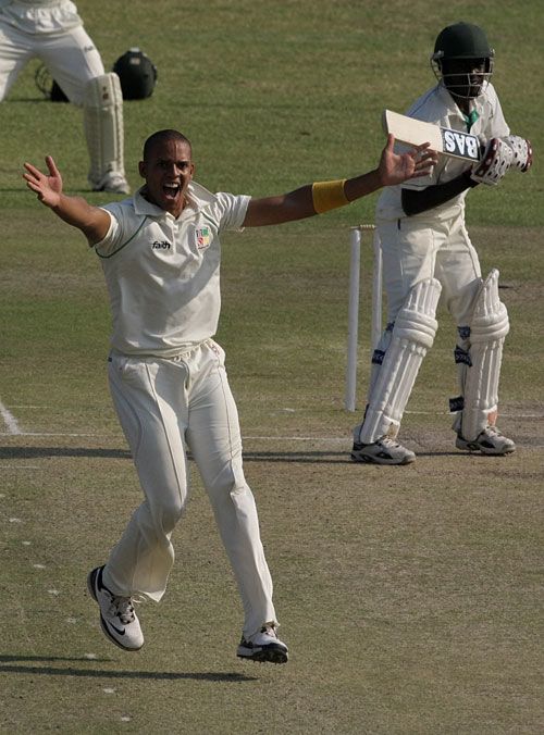 Edward Rainsford appeals for an lbw