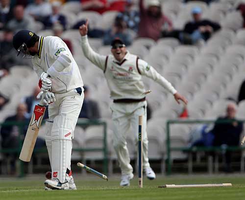 Naqaash Tahir is cleaned up by Glen Chapple