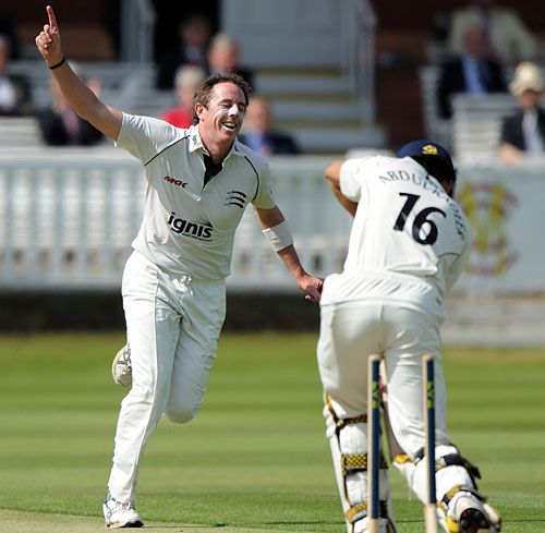 Iain O'Brien celebrates after castling Kadeer Ali