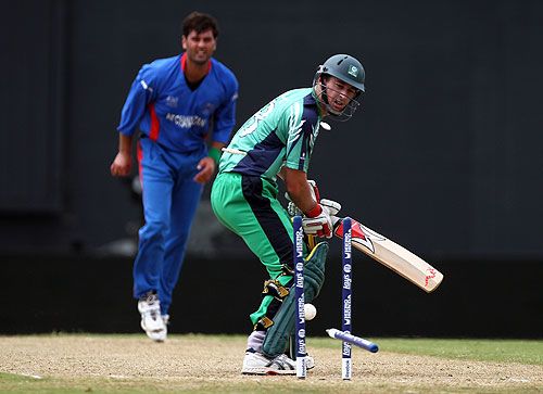 Alex Cusack is bowled by Dawlat Ahmadzai 