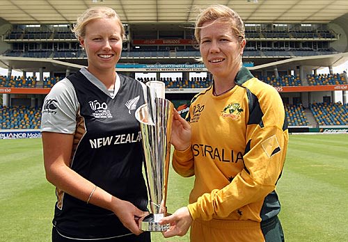 Aimee Watkins and Alex Blackwell pose with the ICC Women's World Twenty20 trophy on the eve of the final