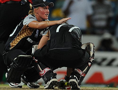 Liz Perry comforts Sophie Devine after New Zealand's loss